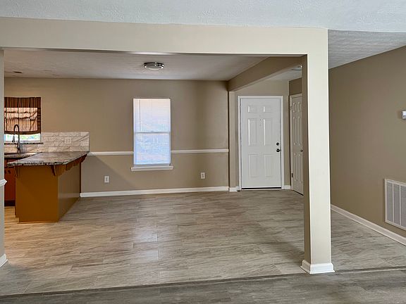 Dining area and foyer from living room/area