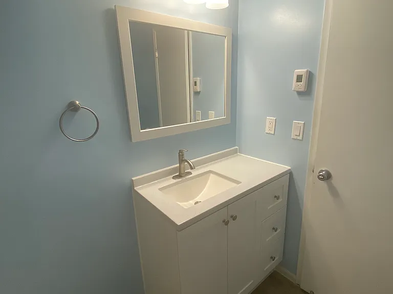 bathroom vanity and mirror