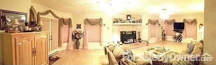 Back yard view
						:
						.69 acre lot w/ deep back yard, large deck, custom shed-backs to trees & marsh