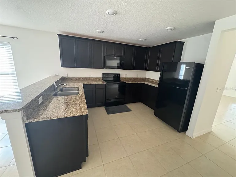 6909 Crested Orchid Dr — Photo 2