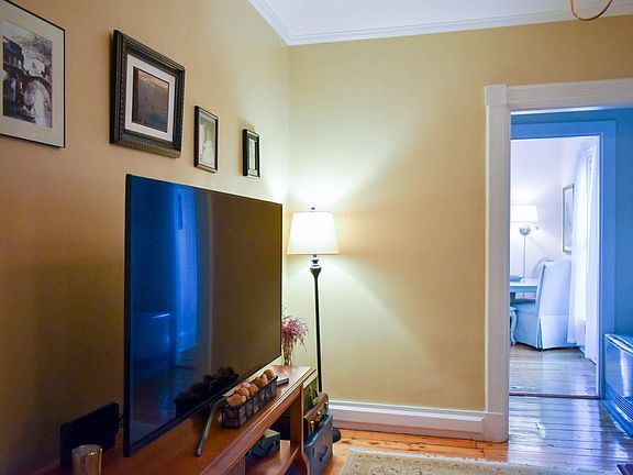 When you first enter the apartment you enter into a beautiful living room and can see through to the kitchen.