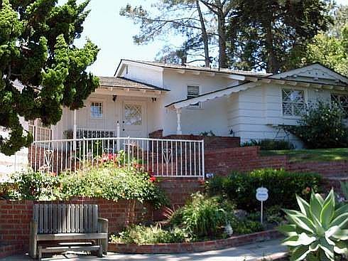 Exceptional Curb Appeal.  Nestled in the Trees with Ocean & Lagood Views.