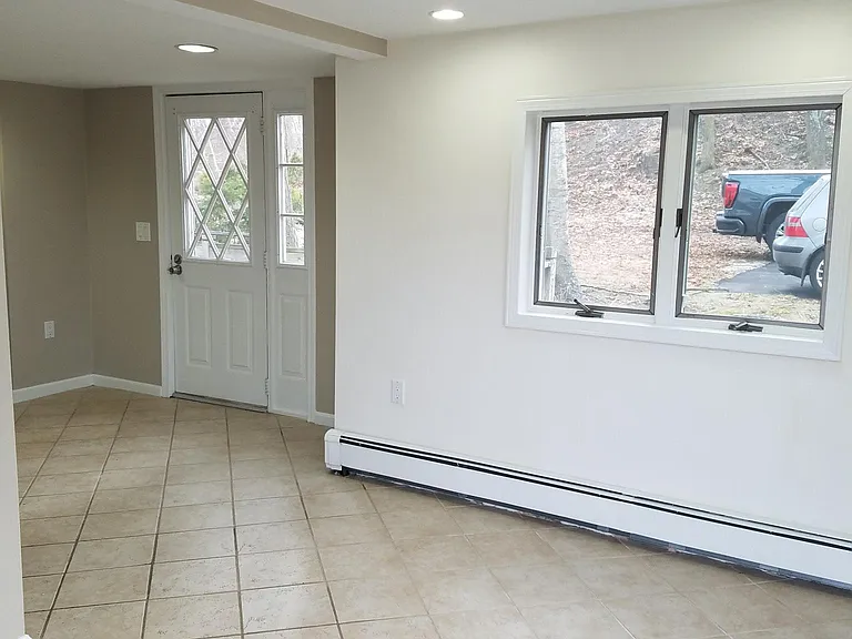 Enteryway with door to deck and patio