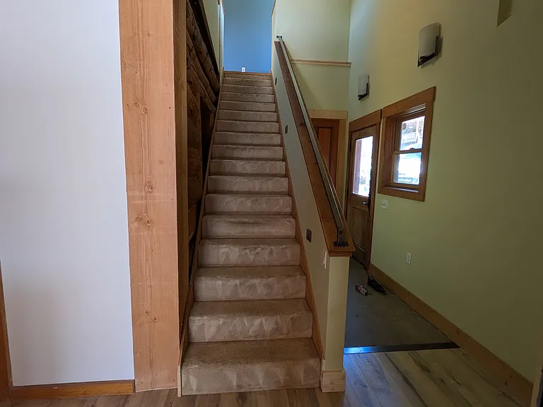Entry and stair up to master bedroom