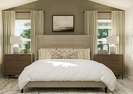 This bedroom has windows that let in plenty of light