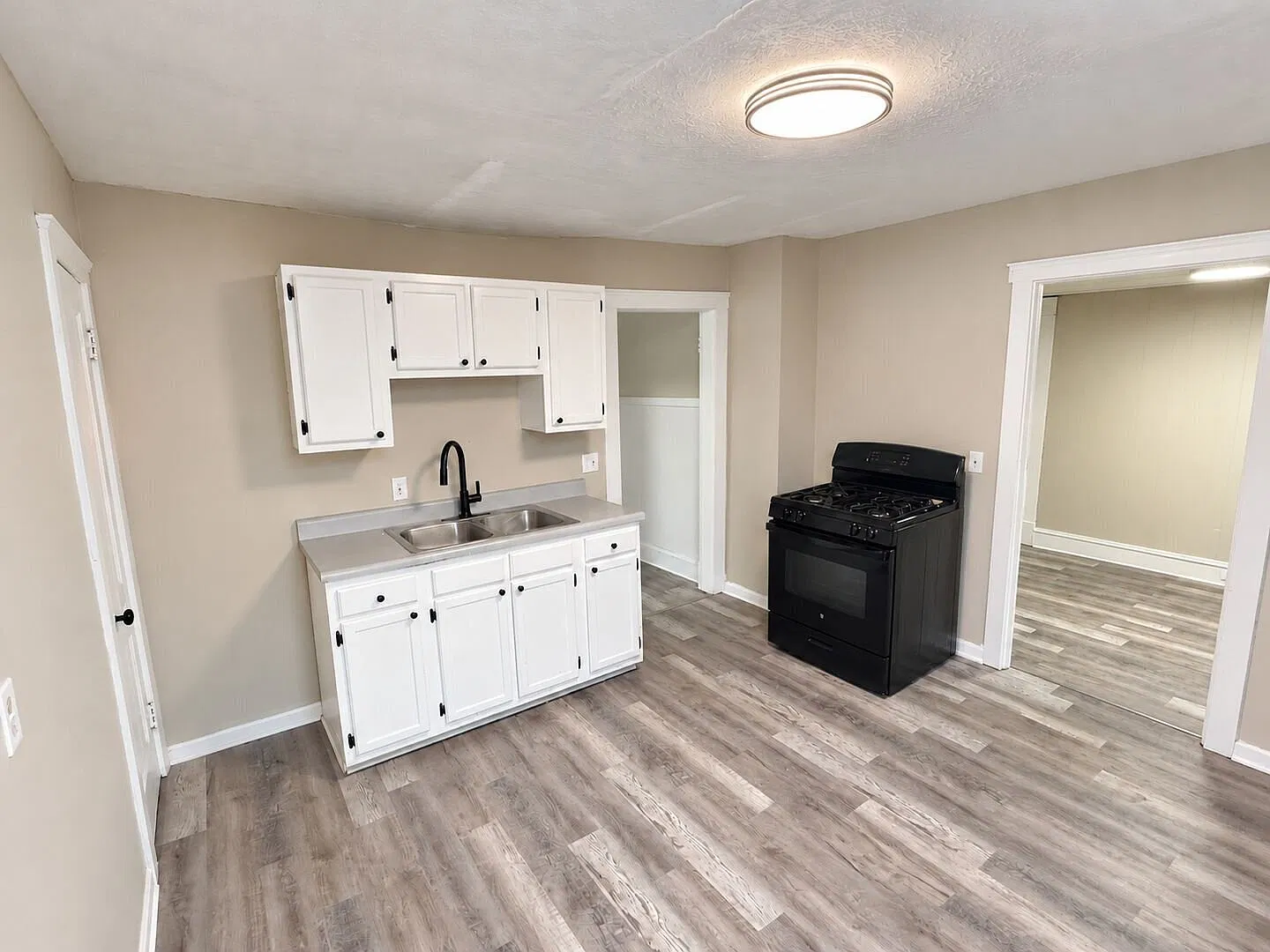 Freshly Updated 3-Bedroom Upper Unit with New Hardwood Floors at 3826 E. 78th St.! — Photo 2