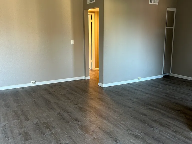 Living room walls have been painted this neutral color. No blue walls.
