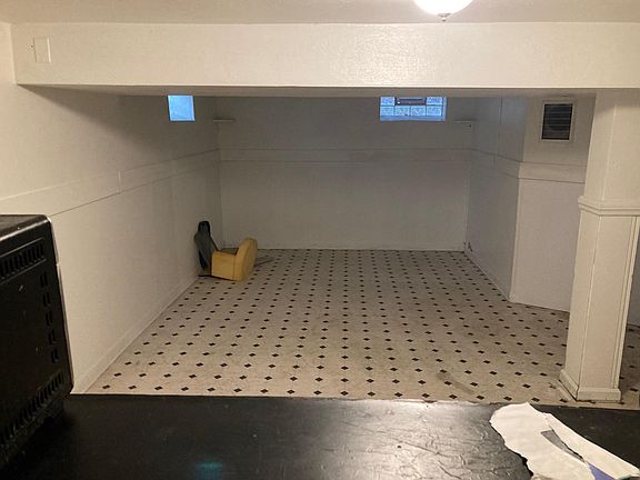 Spacious finished basement bar for entertaining