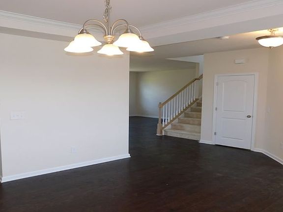 Entry with dining and flex rooms