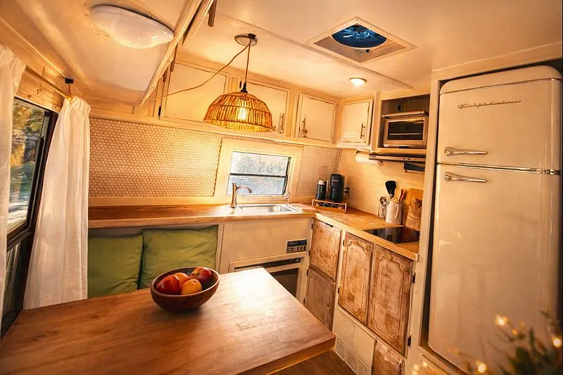 Kitchenette features electric cooktop, toaster oven, full fridge/freezer, and all cooking and serving ware. - Littlefield Ln