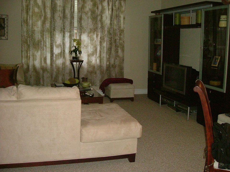 FURNISHED LIVING AND DINING AREA