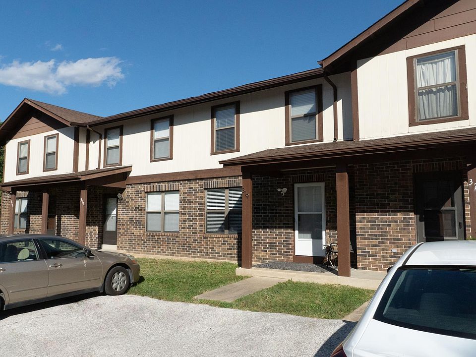 Exterior Unit 319. Two parking spots included.