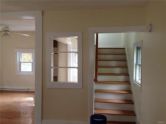 Stairs up to one bedroom