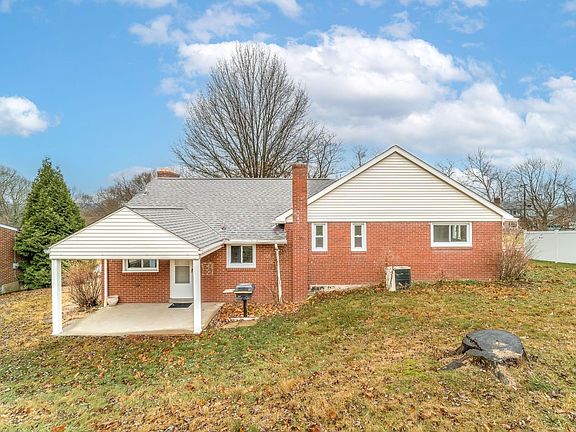 Covered back patio with HUGE yard