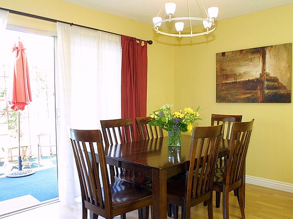 Dining room off kitchen leads to private patio.