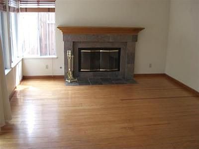 Family room/hardwood floors/fireplace