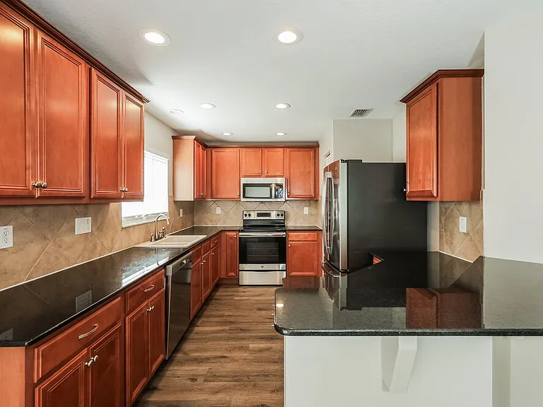 9540 Simeon Dr — Photo 7