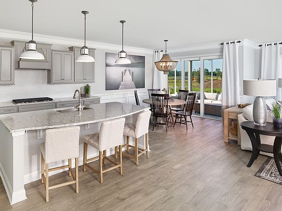 Open Floorplan Layout connects the Kitchen, Dining and Gathering Rooms - Model Representation