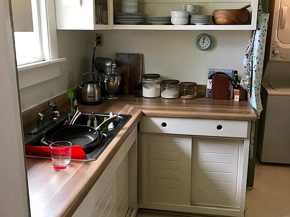 Washer and Dryer in kitchen.
