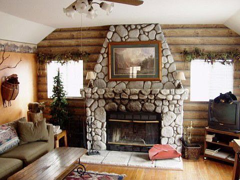 Living room w/rock fireplace