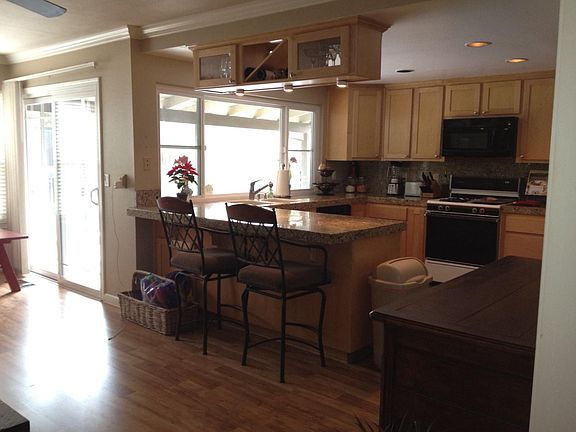 Family room looking into kitchen