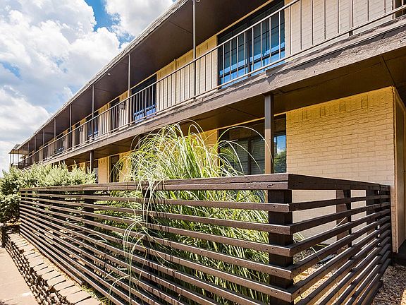 LaVita on Lovers Lane exterior building, fence, and plants