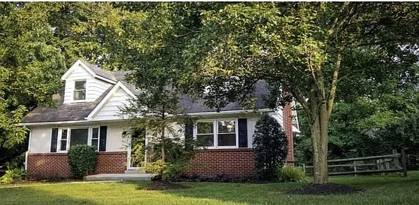 Cute cape cod style with fenced in yard