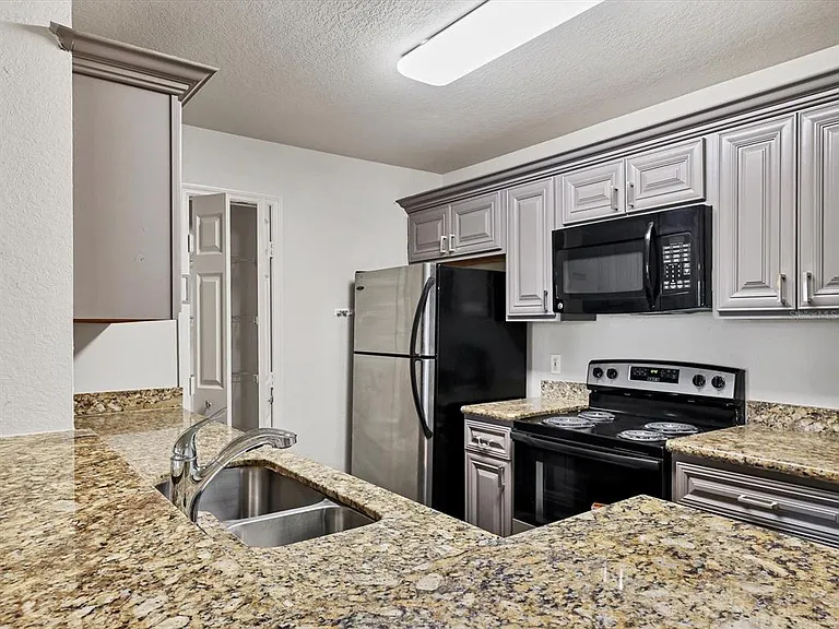 8911 Manor Loop #205 — Photo 13