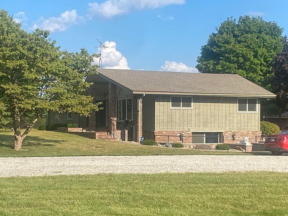 View of the side of the house from the road.