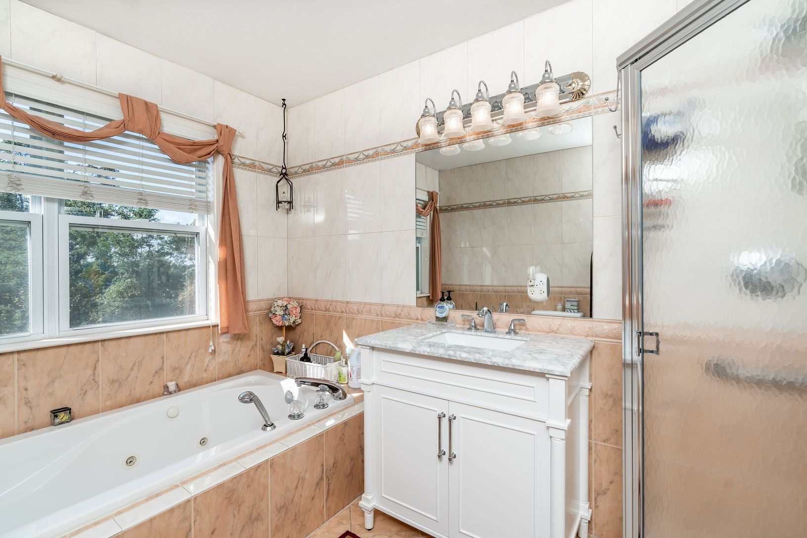  Primary bathroom with stand alone shower and tub