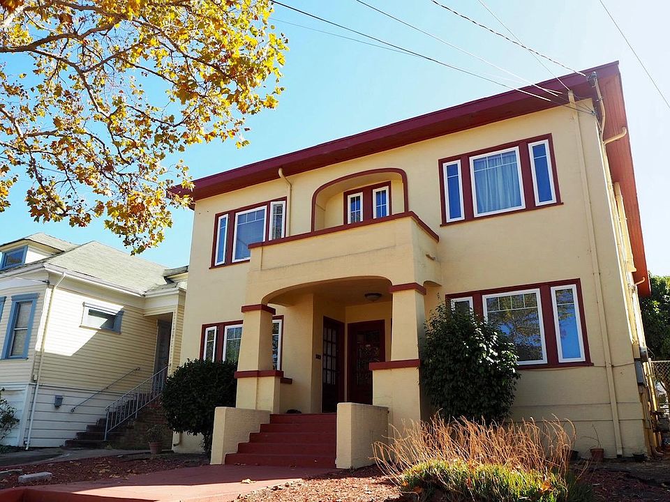 Landscaped front yard on a tree-line street