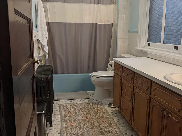 Main bathroom with lots of storage.