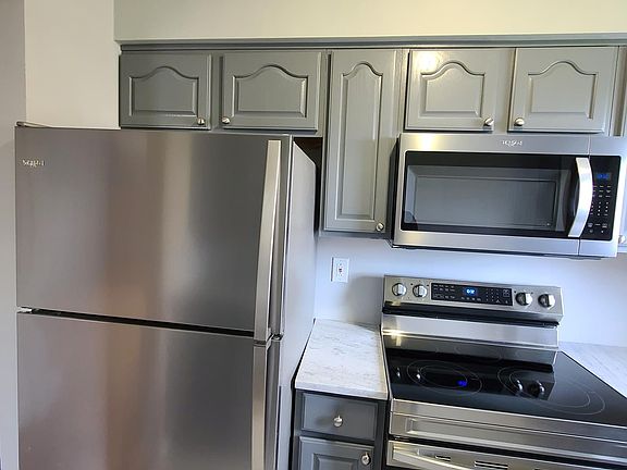 Kitchen with new stainless steel appliances