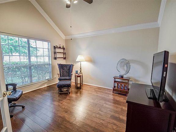 Light and bright, this room would make a great home office!