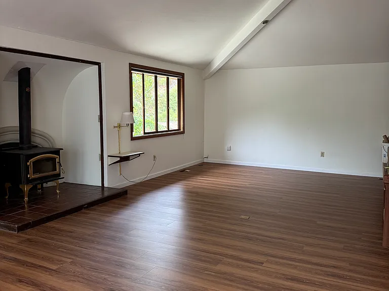 Large living room with wood burning stove