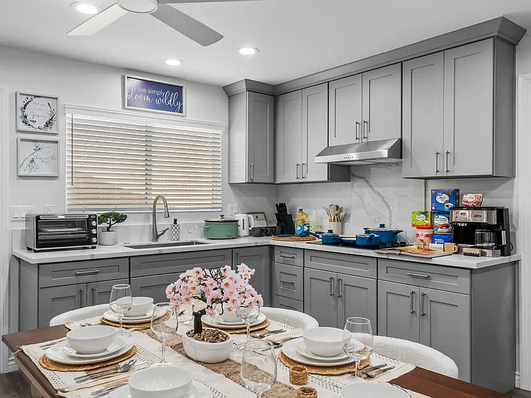 Gather 'round! Enjoy breakfast, dinner, or game night at this charming dining space.