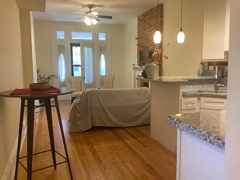 Kitchen area looking toward the front door.