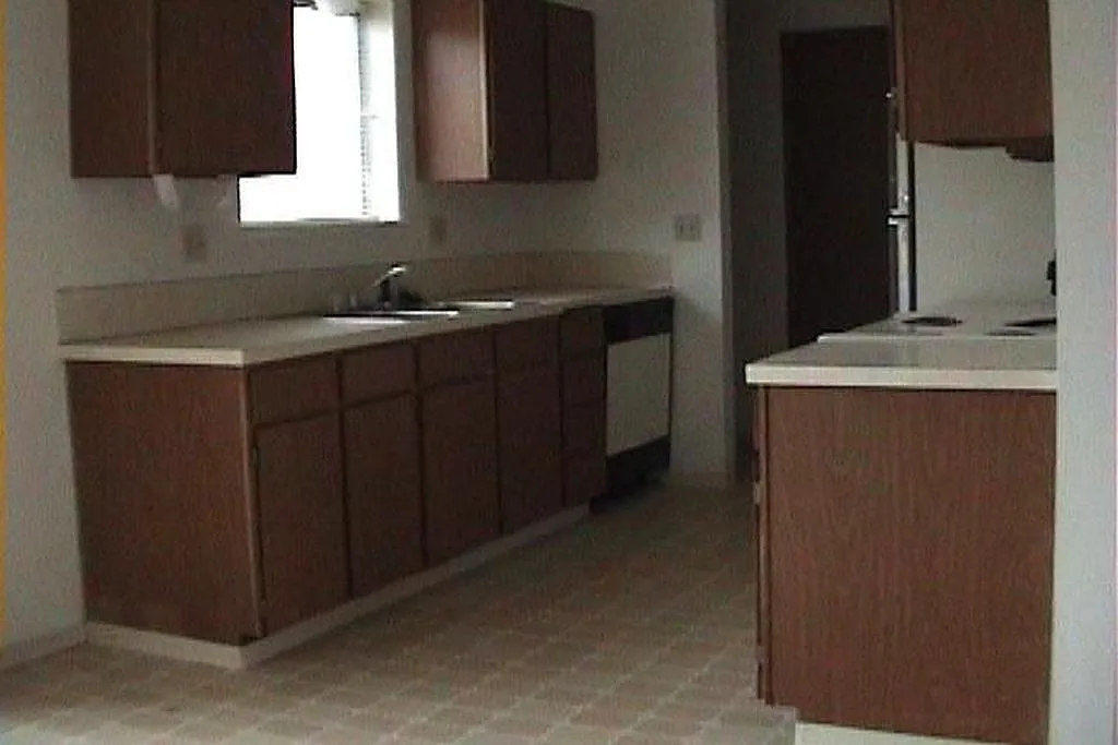 Spacious Three Bedroom Townhome with Attached Garage!! — Photo 1