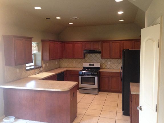 Large kitchen with plenty of counter space and cabinet stora