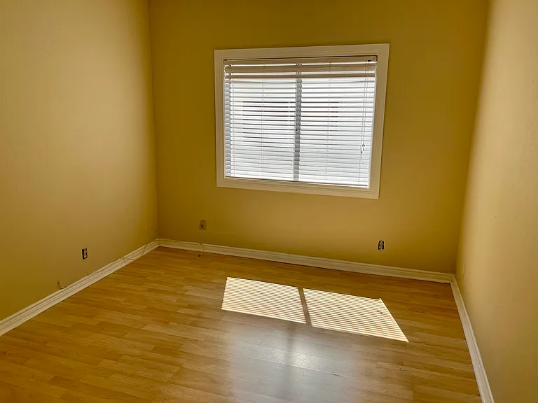 Master Bd unfurnished view
Walls are light cream color; photo color distorted