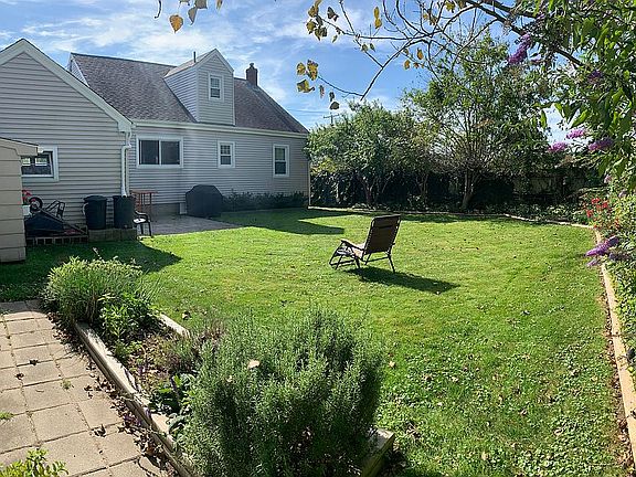 Large sunny fenced back yard