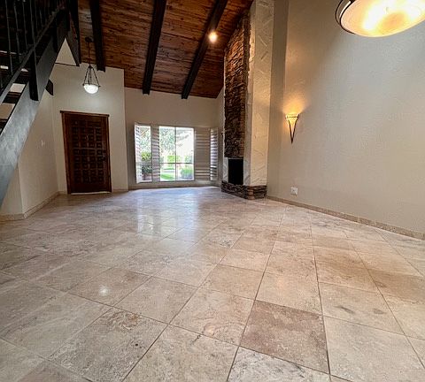 SOARING CEILINGS WITH BEAUTIFUL WOOD ACCENTS