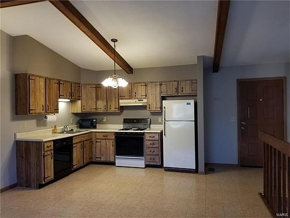 Kitchen -- refrigerator stays.