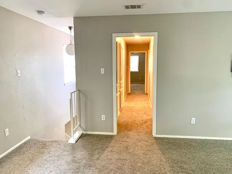 To upstairs bedrooms