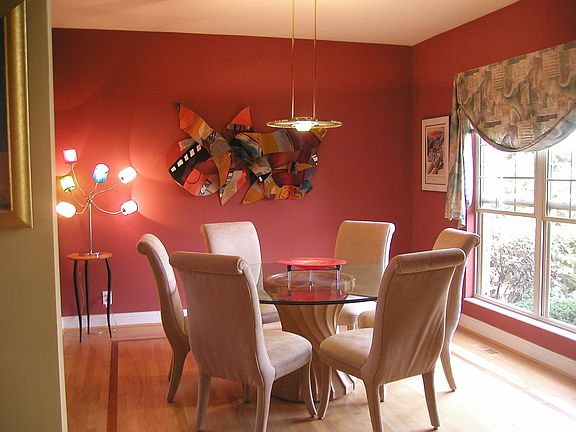 Hardwood floors in dining room lend elegance