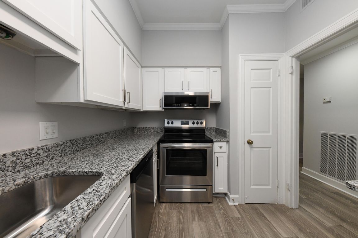 Modern Cabinetry + Hardwood Style Flooring