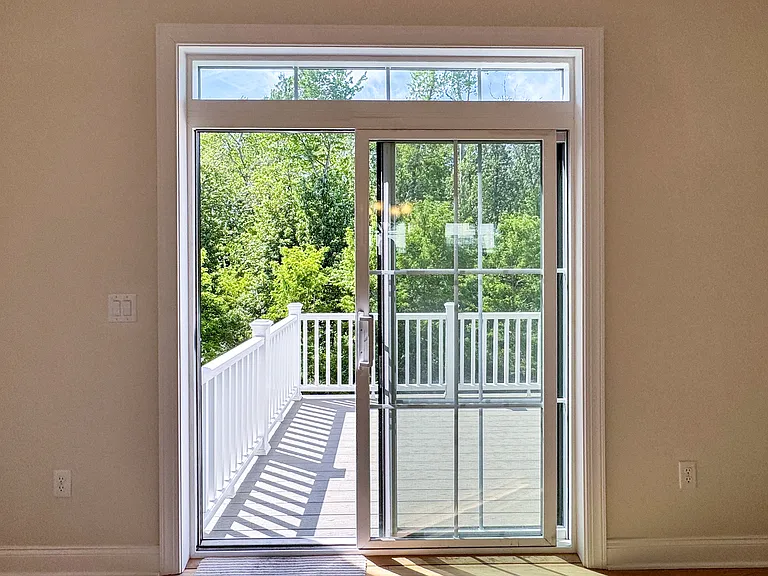A serene backdrop for every meal. Large glass sliders in the dining room lead to a private outdoor deck.