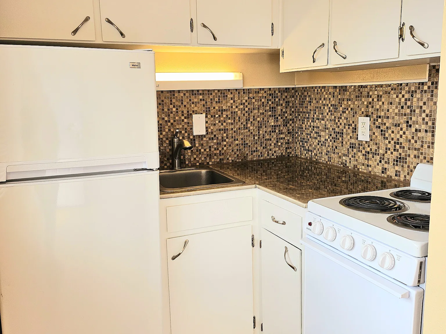 Olympus Apartments — Photo 1