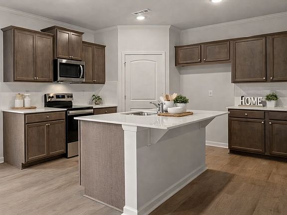 Modern kitchen with lots of storage and LARGE pantry!
