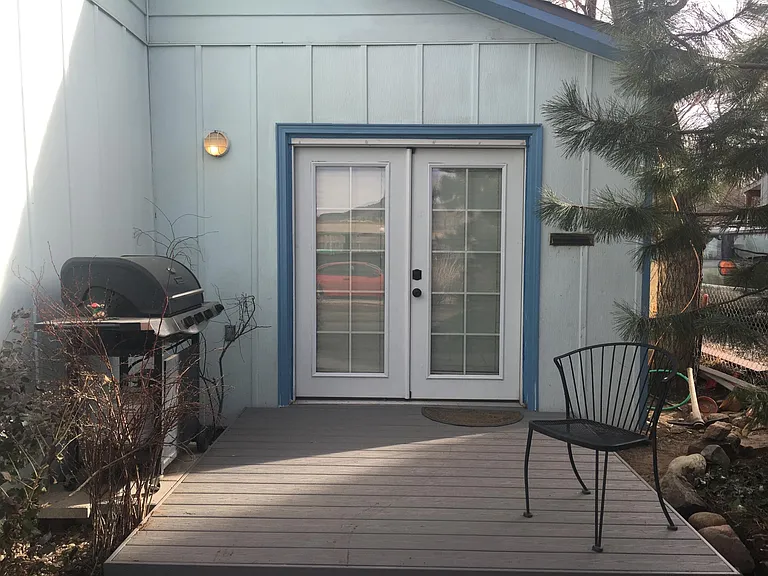 Deck off of kitchen. Grill included.